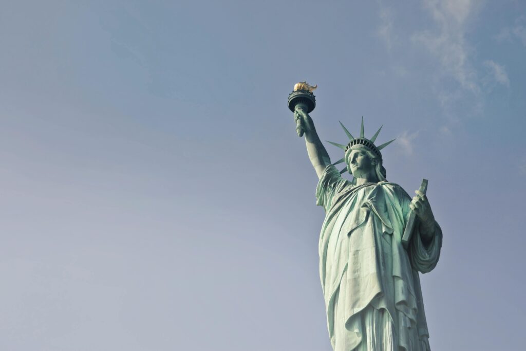 pexels-photo-722014-722014 Low angle view of the Statue of Liberty against a clear blue sky, symbolizing freedom in New York.